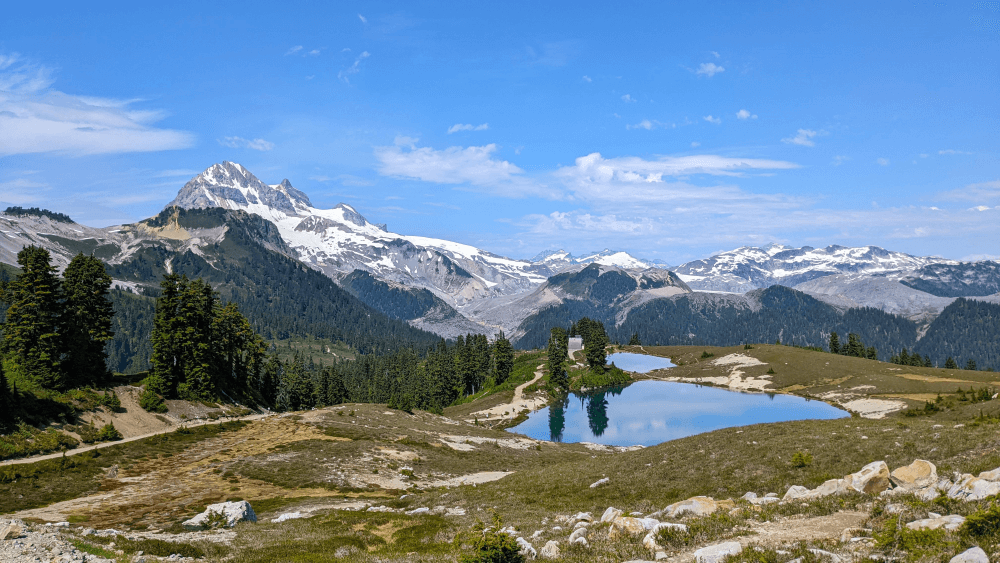 view of Mount Garibaldi with Elfin Lakes campground in the foreground